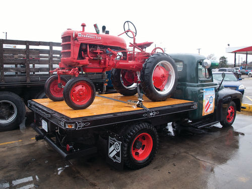 Richard Thrasher’s McCormick Farmall Cub on the back of his International